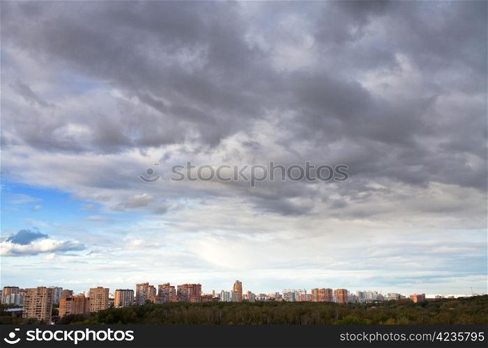 grey autumn clouds under city afternoon