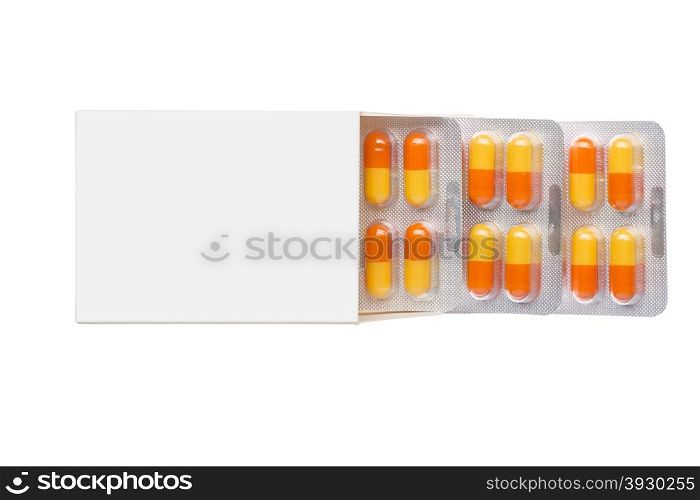 Grey box with orange pills in a blister pack on an isolated background. Grey box with orange pills in a blister pack