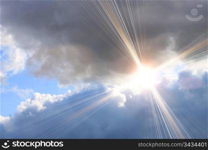grey clouds and bright sunlight on sky background