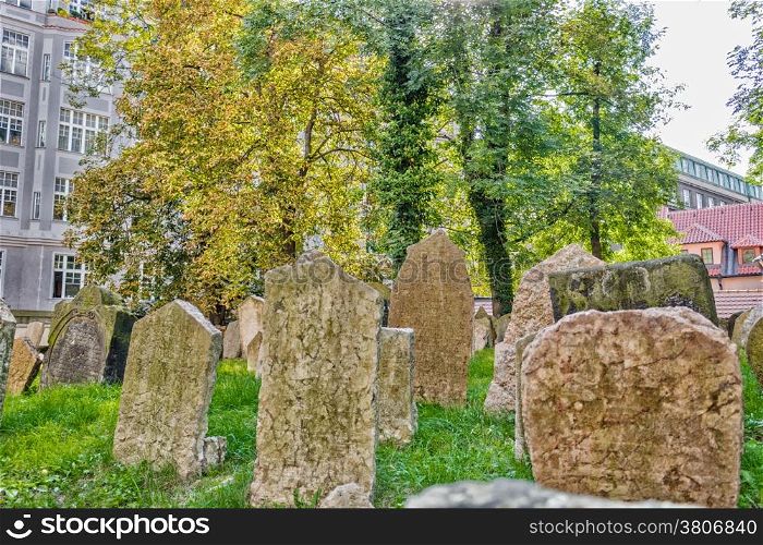 Grey crowded tombstones in the Old Jewish Cemetery in Prague