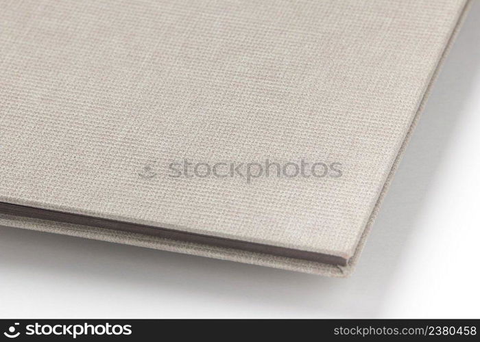 Grey hardcover book on white background. book album on a white background