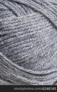 Grey knitting wool, close crop.