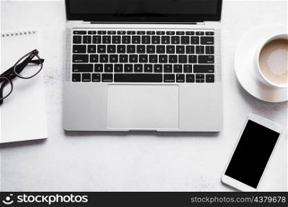 grey laptop with office elements