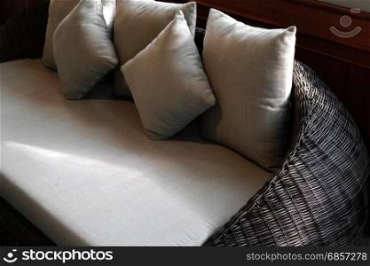 grey pillow on sofa in living room