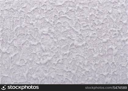 Grey roughcast wall plaster texture