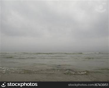 grey seascape. grey seascape with fog and waves in the baltic sea