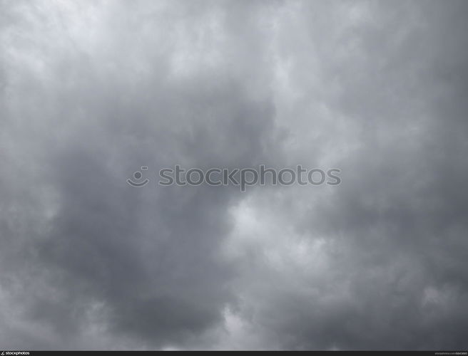 grey sky with clouds background. grey sky with clouds useful as a background