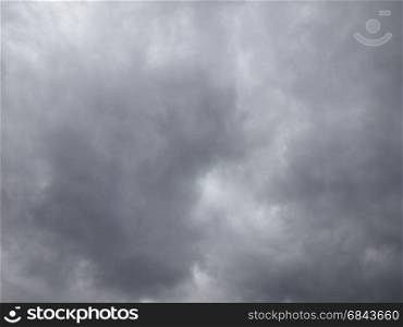 grey sky with clouds background. grey sky with clouds useful as a background