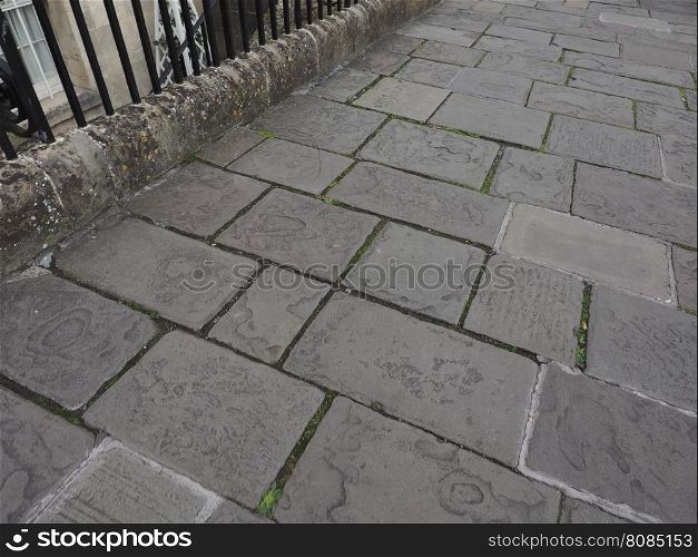 Grey stone floor background. Grey stone floor pavement useful as a background