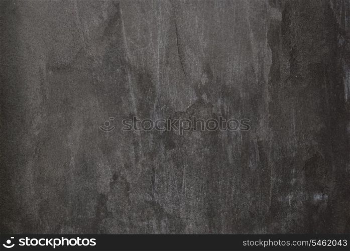 Grey texture of a dark concrete wall