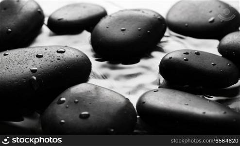 Grey wet pebbles background wallpaper. Grey wet pebbles background