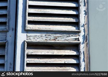 grey window castellanza palaces italy abstract sunny day wood venetian blind in the concrete brick