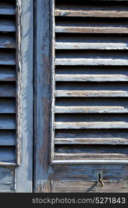 grey window castellanza palaces italy abstract sunny day wood venetian blind in the concrete brick