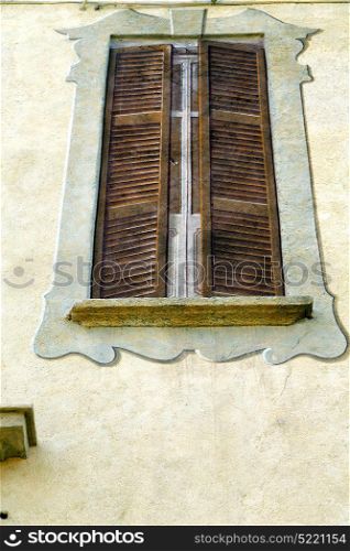 grey window jerago palaces italy abstract sunny day wood venetian blind in the concrete brick