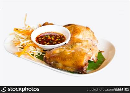 grill chicken with spicy soup on white background