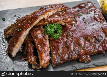 Grilled Barbecued Pork Baby Back Ribs, close up