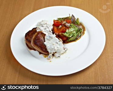 grilled beef fillet medallion with sauce