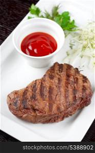 grilled beef steak and sauce