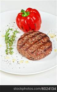 grilled beef steak . grilled beef steak with herbs and pepper