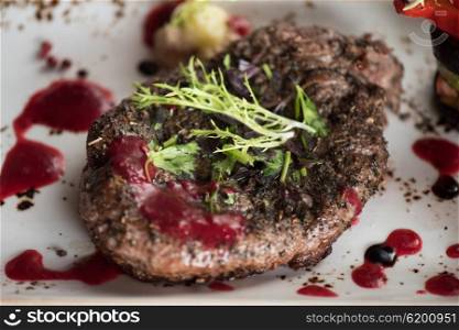 grilled beef steak. grilled beef steak with herbs vegetables and sauce