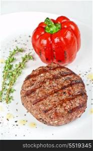 grilled beef steak with herbs and pepper