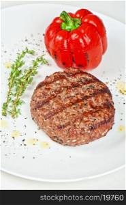 grilled beef steak with herbs and pepper. beef steak