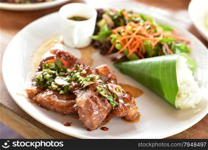 Grilled beef steak with spicy sauce, Thai food.