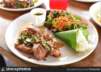 Grilled beef steak with spicy sauce, Thai food.