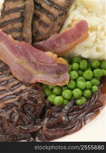 Grilled Calves Liver and Bacon with Mashed Potato and Peas