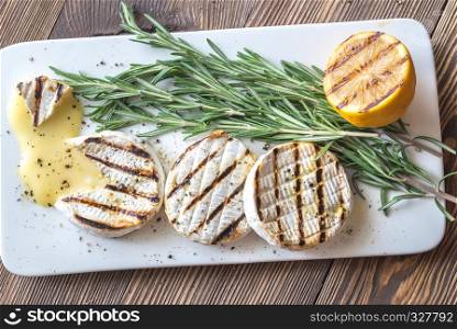 Grilled Camembert cheese with rosemary