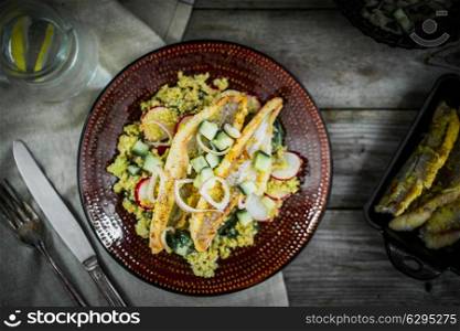 Grilled catfish with quinoa and radish salad