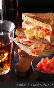 grilled cheese sandwich with ham and tomato