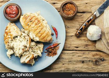 Grilled chicken breast stuffed with feta cheese and garlic.. Chicken breast with feta cheese