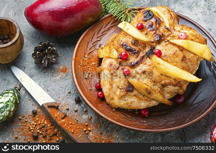 Grilled chicken breast with mango.Christmas baked chicken. Fried chicken with mango