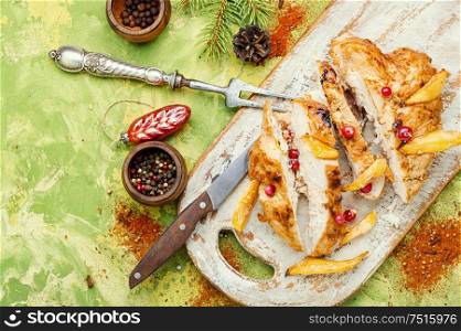 Grilled chicken breast with mango.Grilled chicken fillets.Christmas baked chicken. Sliced grilled chicken breast