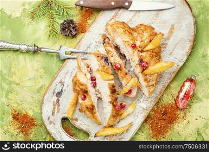 Grilled chicken breast with mango.Grilled chicken fillets. Sliced grilled chicken breast