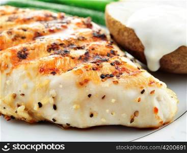 grilled chicken breast with vegetables, close up