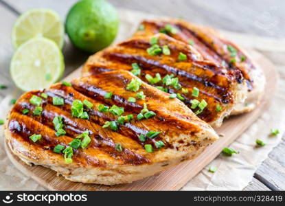 Grilled chicken breasts in lime sauce