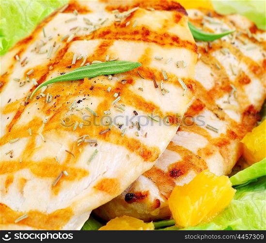 Grilled chicken fillet with rosemary and orange, tasty meal, healthy eating concept