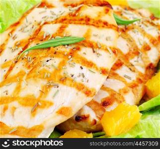 Grilled chicken fillet with rosemary and orange, tasty meal, healthy eating concept