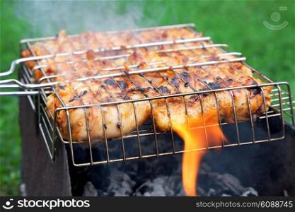 grilled chicken in barbecue grate