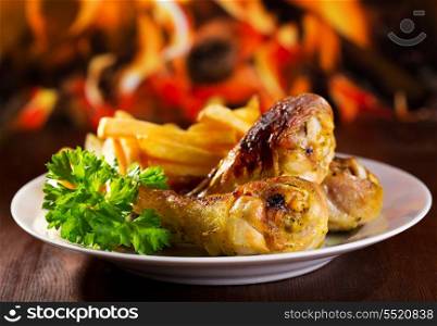 grilled chicken legs with fries