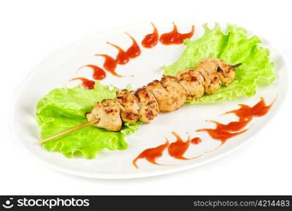 Grilled chicken meat and vegetables isolated on a white background