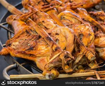 grilled chicken sold by street food vendor