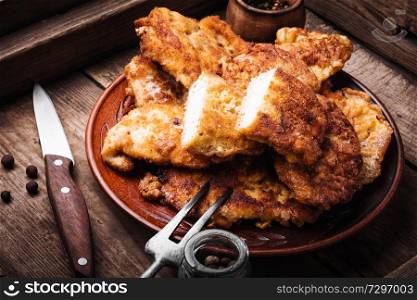 Grilled chicken steak on a plate.Grilled meat.Sliced chicken breast grill. Grilled chicken breast steak