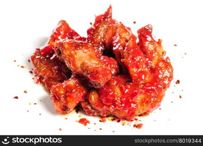 grilled chicken wings in hot raspberry sauce. chicken wings in raspberry sauce