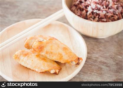 Grilled chicken wings with multi grains berry rice, stock photo