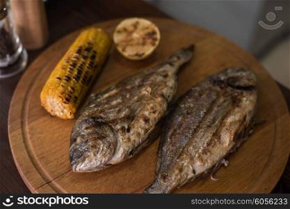 Grilled dorado fish. Grilled dorado with vegetables preparing