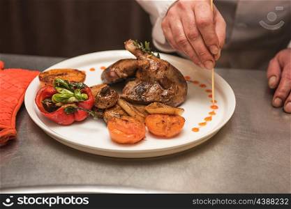 grilled duck legs. grilled duck legs with vegetables