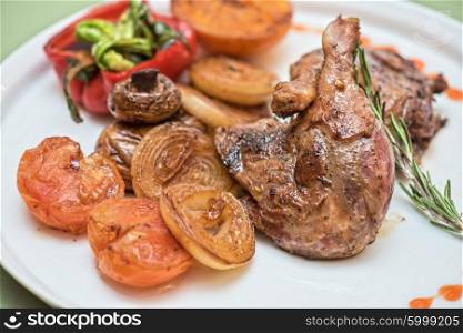 grilled duck legs. grilled duck legs with vegetables